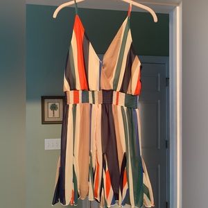 Size small romper looks like a dress but is a romper. Worn once.